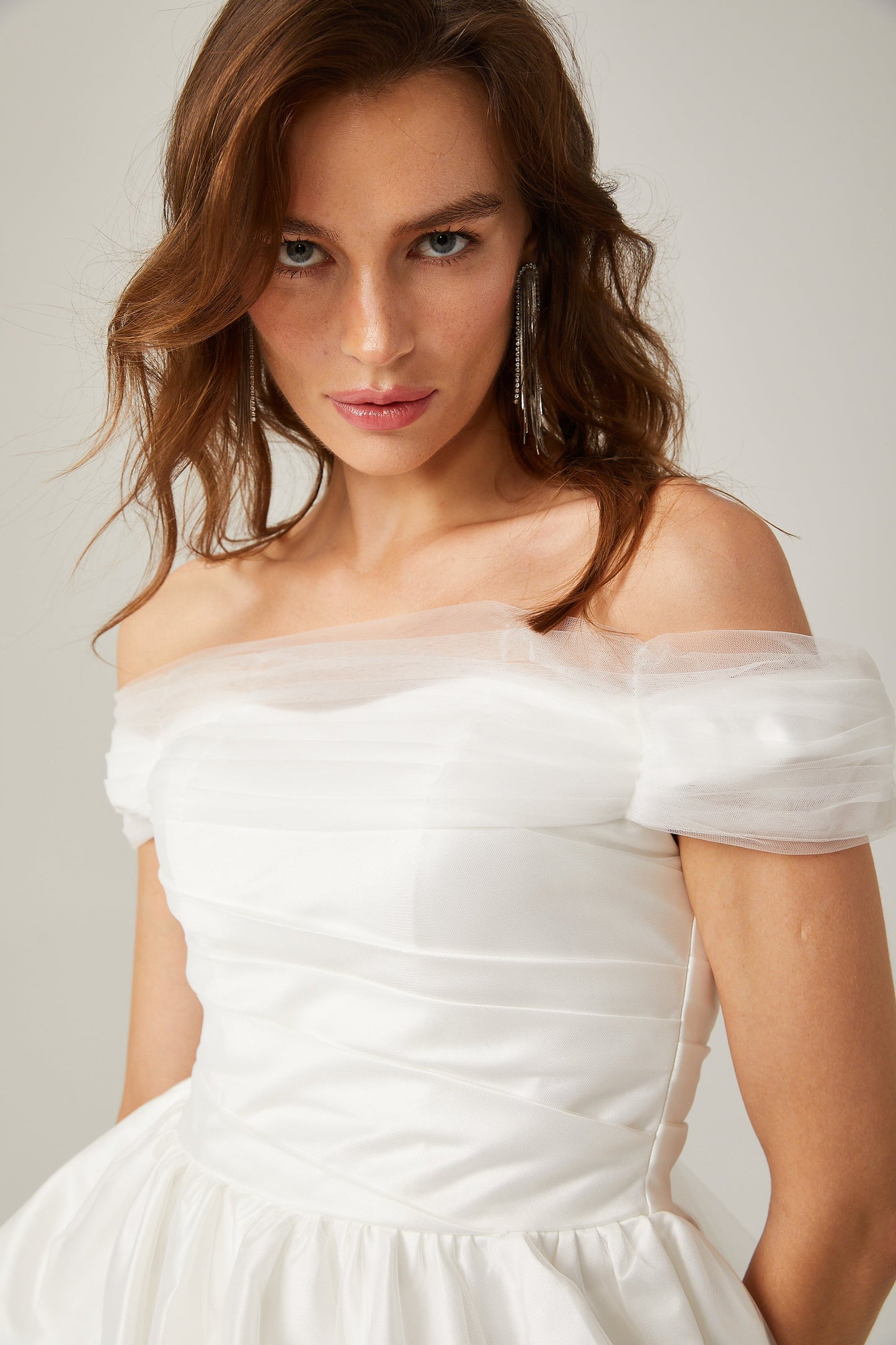 Aurore white off-shoulder bowknot mini dress