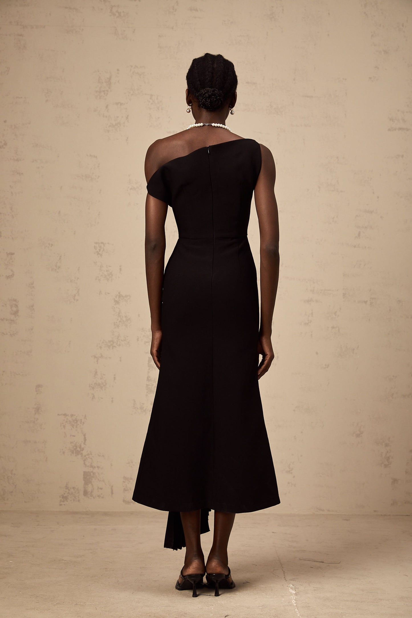 Laurine asymmetrical draped midi dress in Black