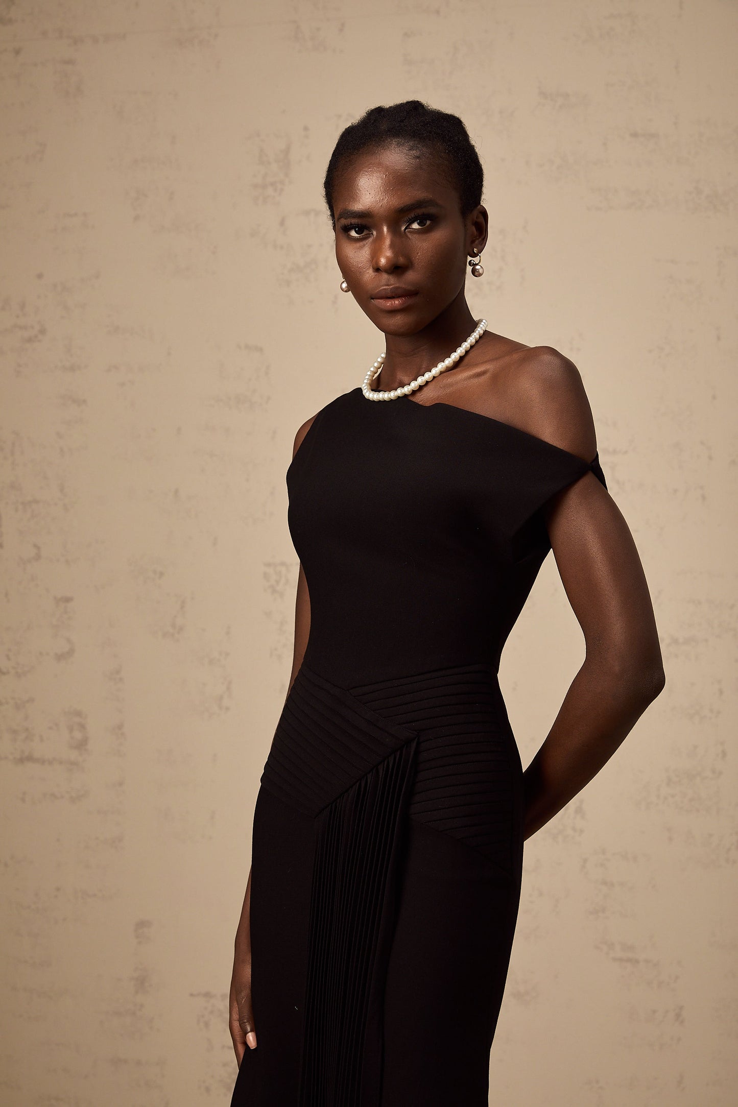 Laurine asymmetrical draped midi dress in Black