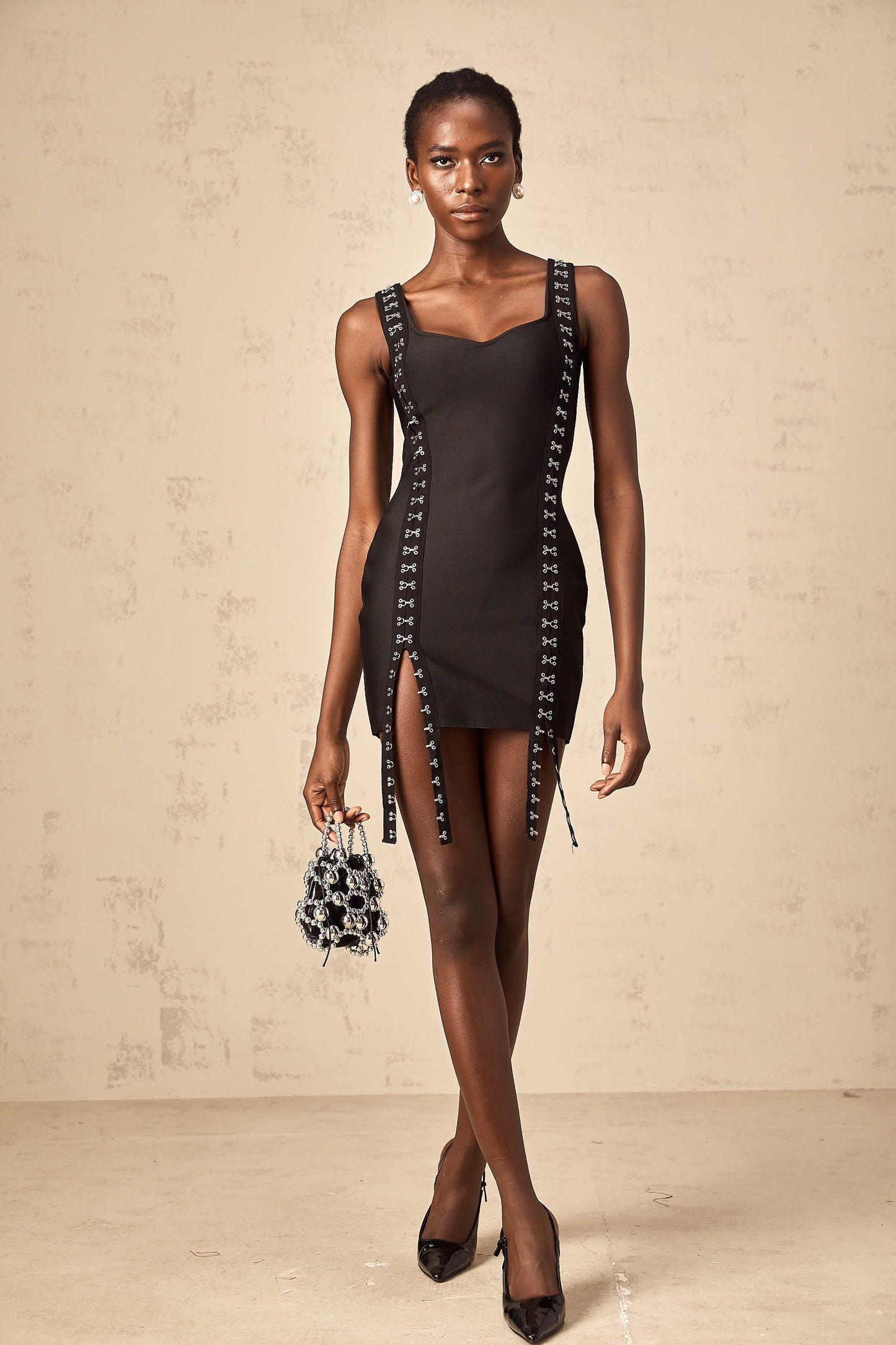 Irina black hook-and-eye bandage mini dress