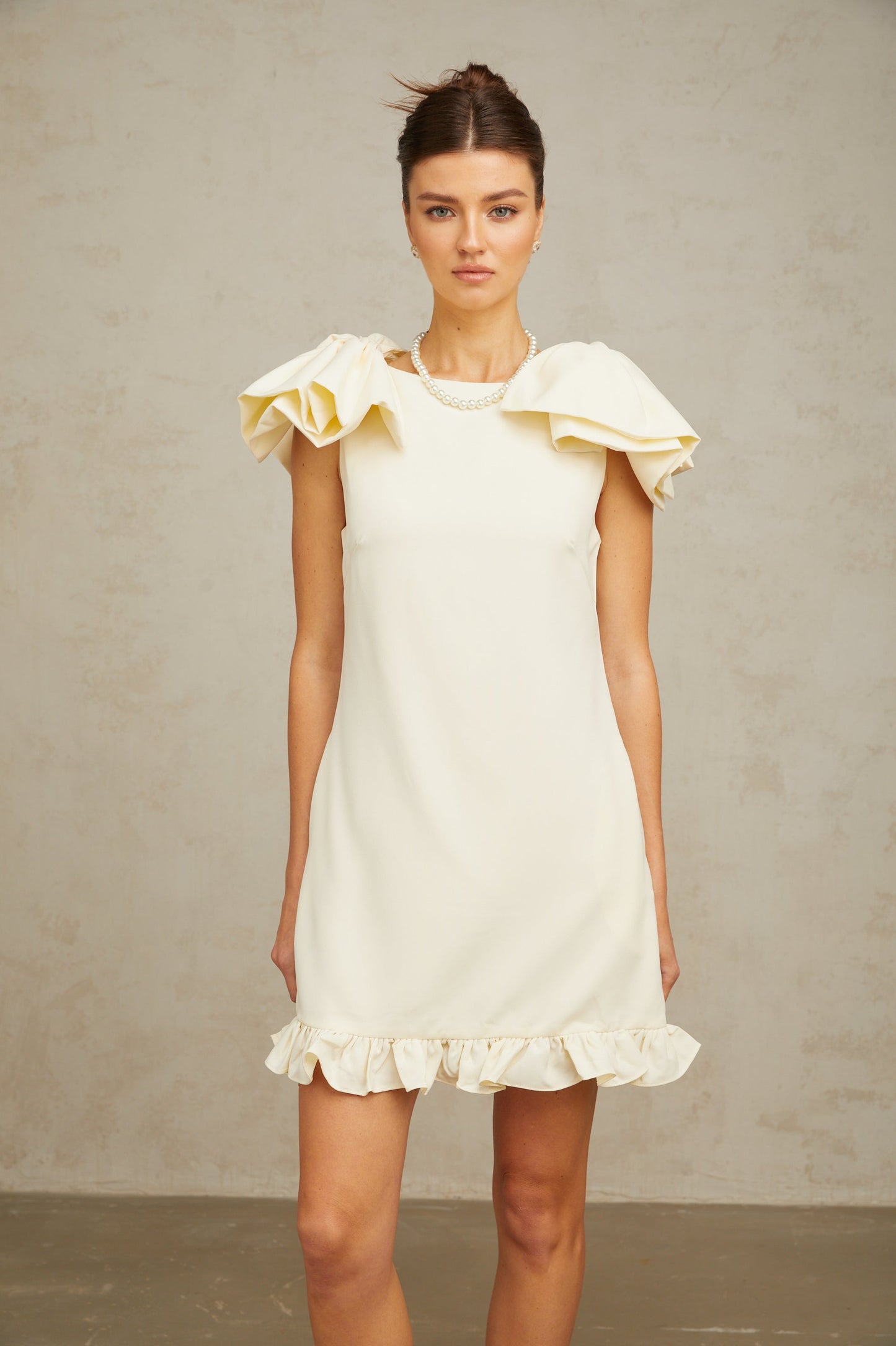 Constance white bow ruffled mini dress