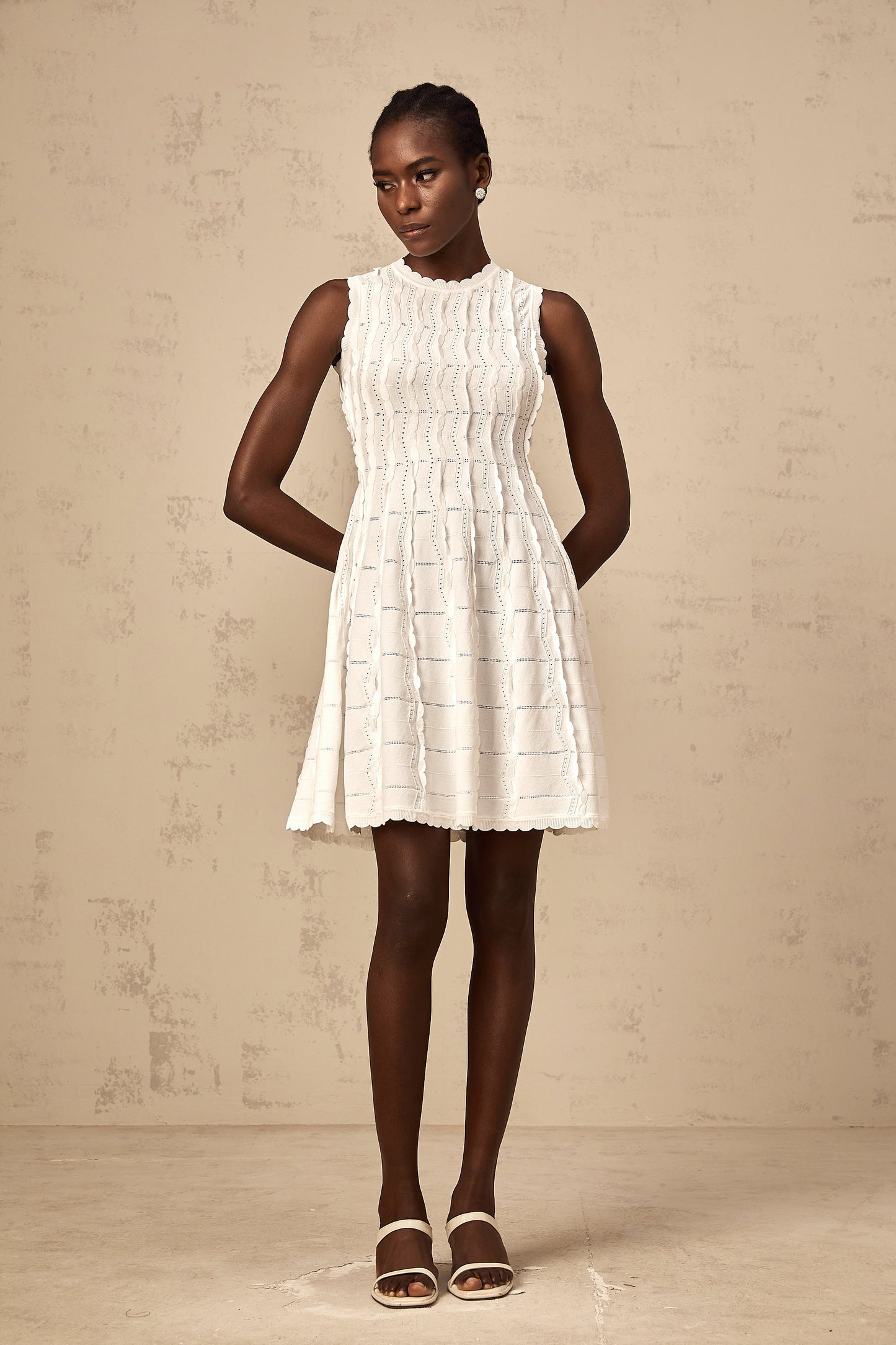 Esmée white ruffled sleeveless knit mini dress