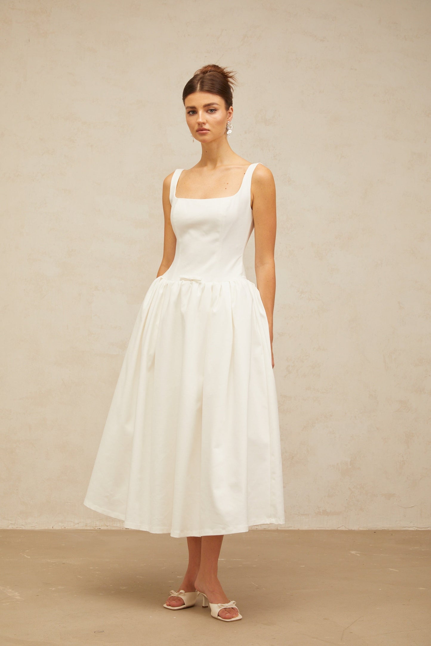 Perrine white bowknot flounce midi dress