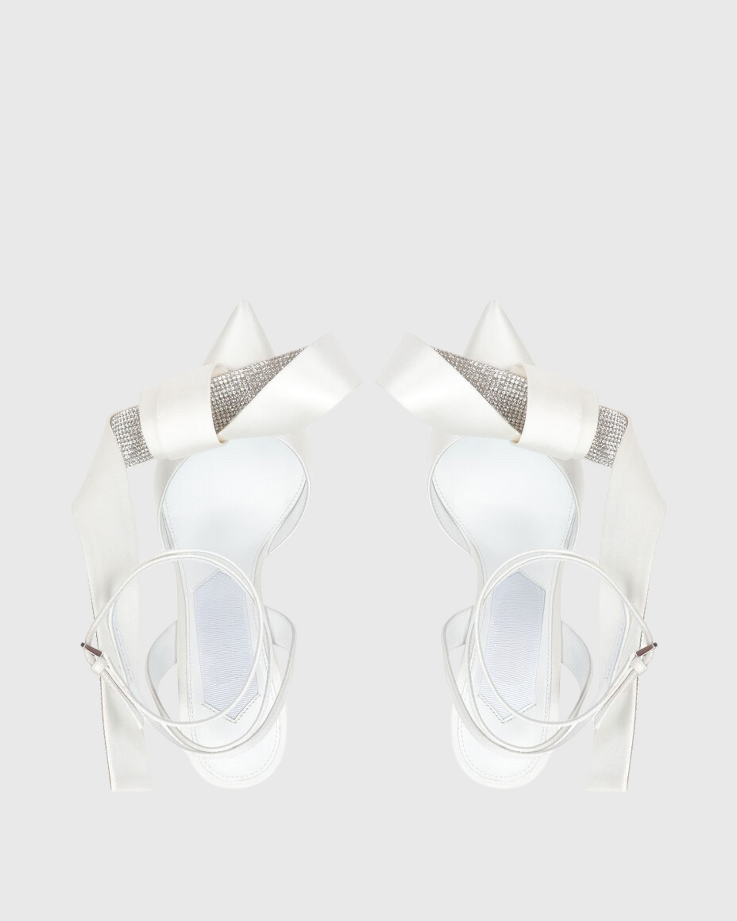 Crocifissa Spiral Rhinestone Bow Pumps In White