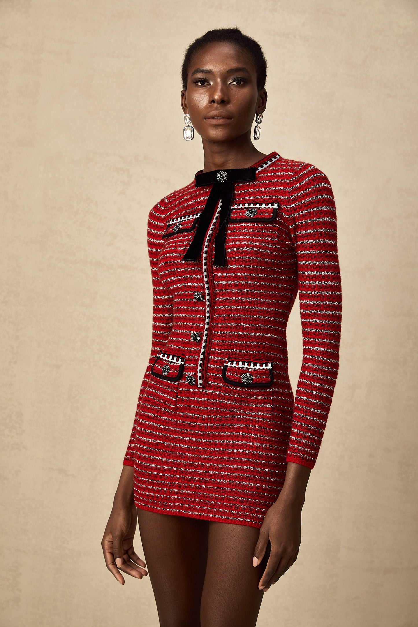 Faustine bow-detailed knit mini dress