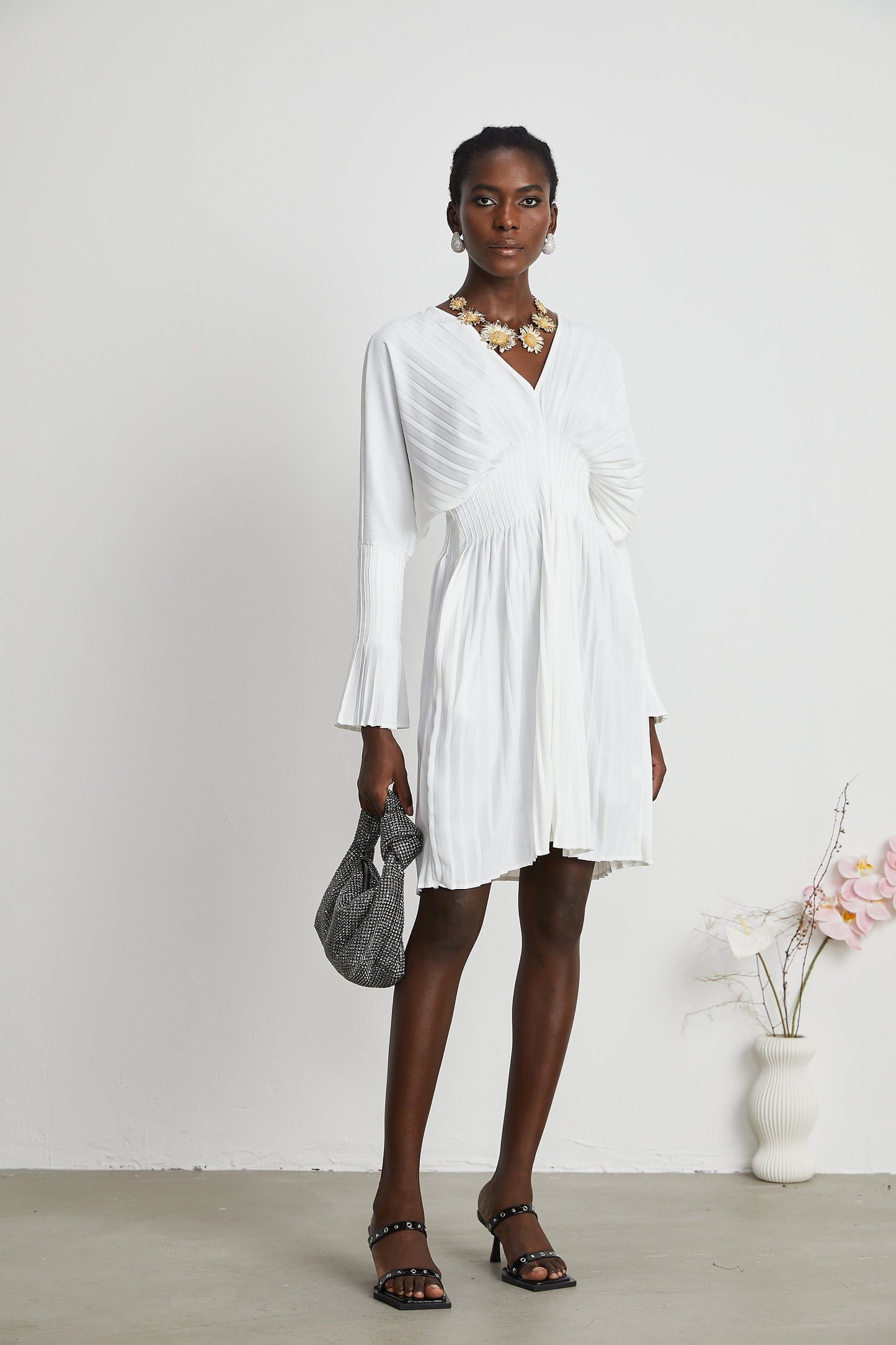 Claudette V-neck pleated mini dress