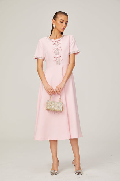 Cassiopeia crystal-accented pink bow midi dress