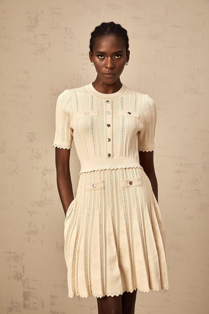 Amélie neutrals pointelle-trim pleated knit mini dress
