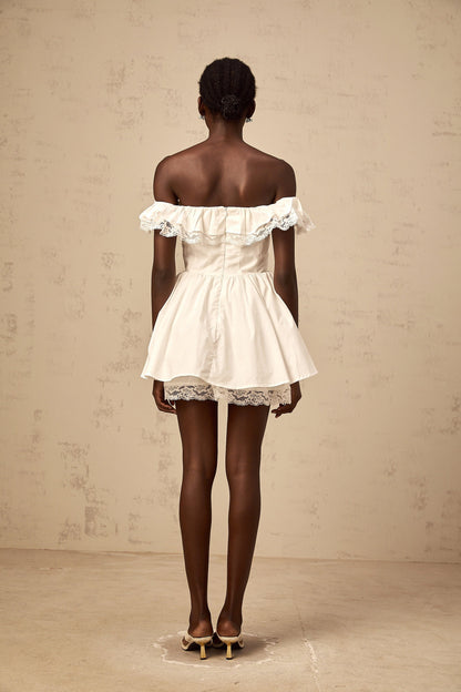 Arsène white oversize-bow ruffled mini dress