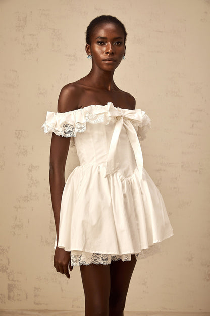 Arsène white oversize-bow ruffled mini dress