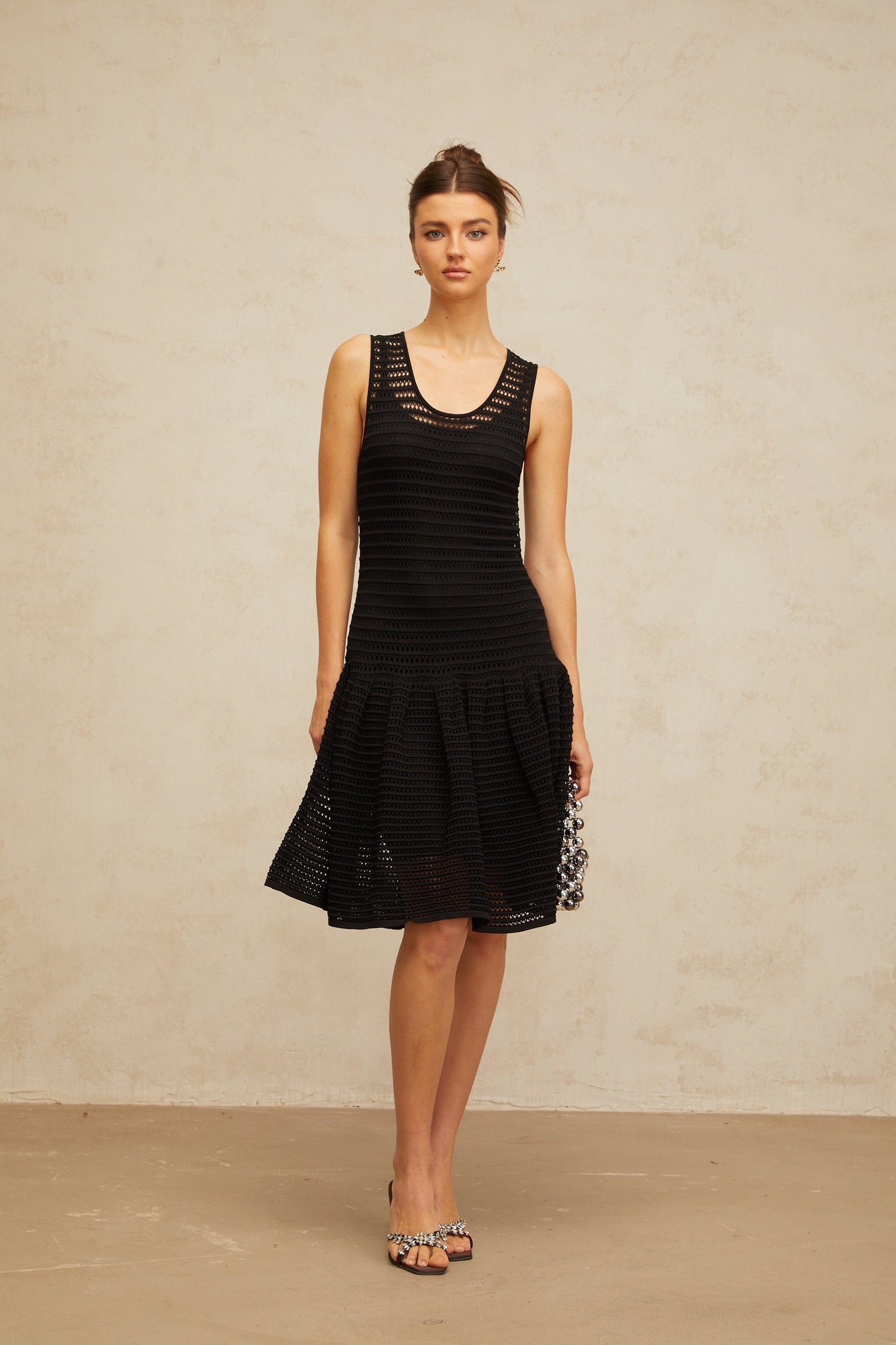 Maelle black flounced pointelle-knit mini dress