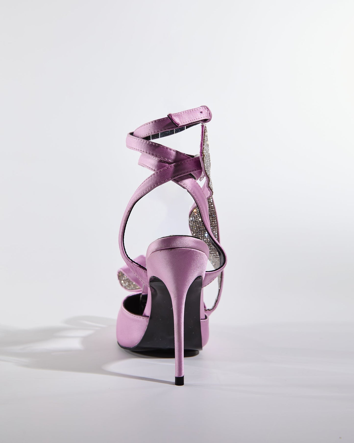 Crocifissa Spiral Rhinestone Bow Pumps In Lilac