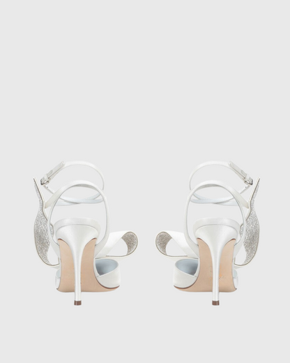 Crocifissa Spiral Rhinestone Bow Pumps In White