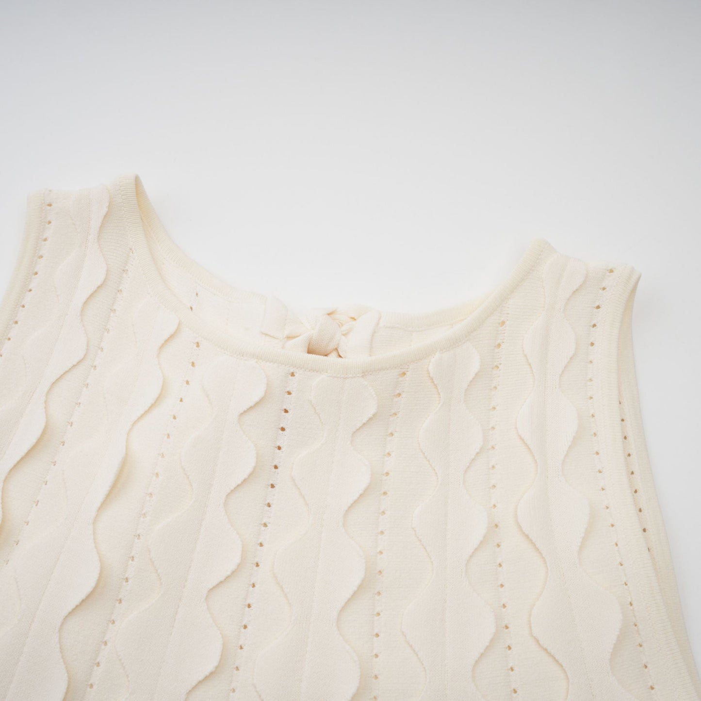 Axelle white wavy-detail sleeveless mini dress