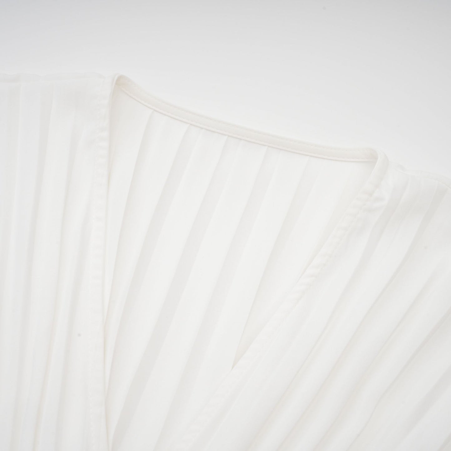 Claudette V-neck pleated mini dress