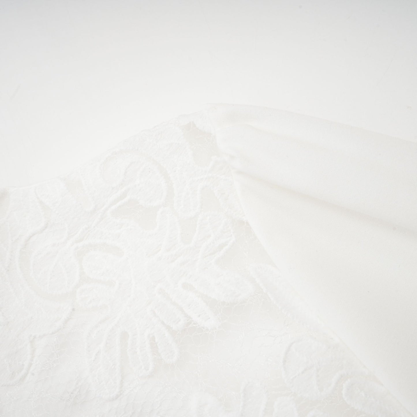 Madeleine white panelled embroidered midi dress