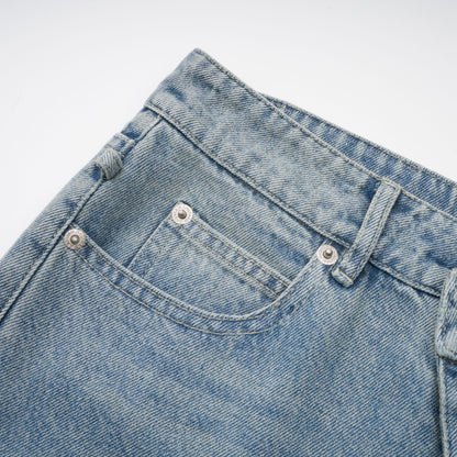 Géraldine strap-detail jeans