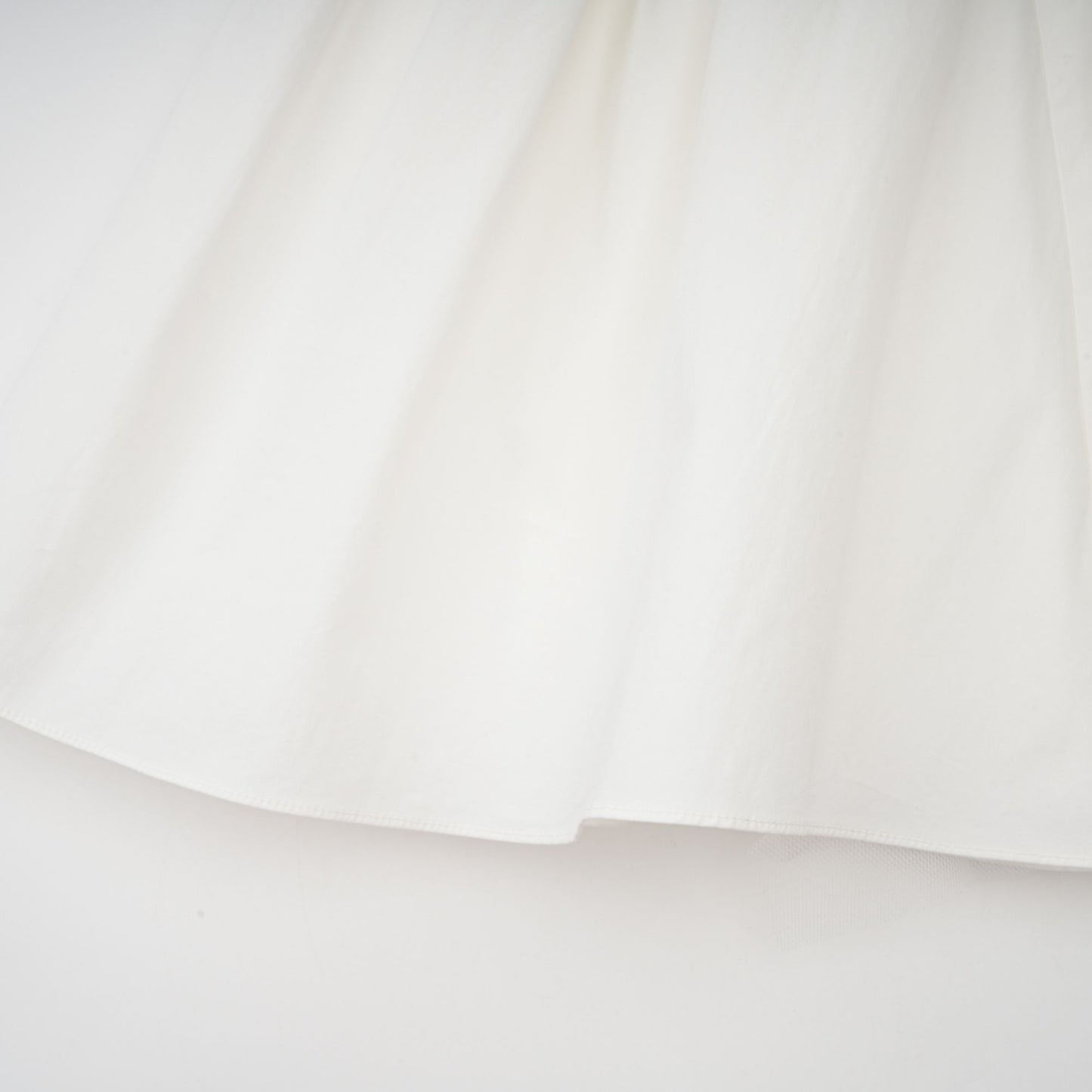 Julie white folded-neck bonded sleeveless mini dress