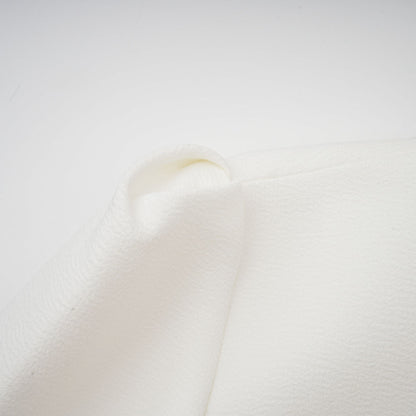 Élise pleated peplum-hem blazer dress in White
