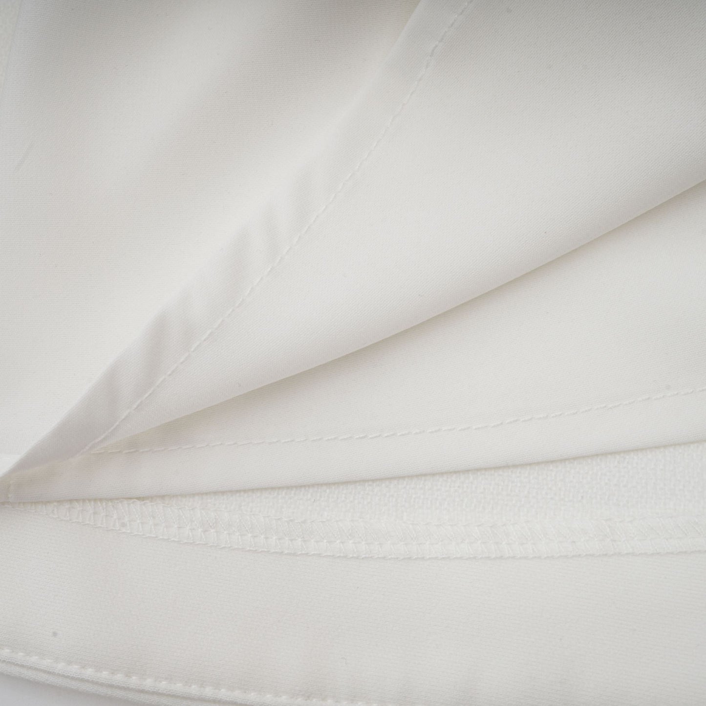 Élise pleated peplum-hem blazer dress in White