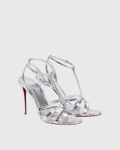 Selini Cross Metallic Strap Sandals In Silver